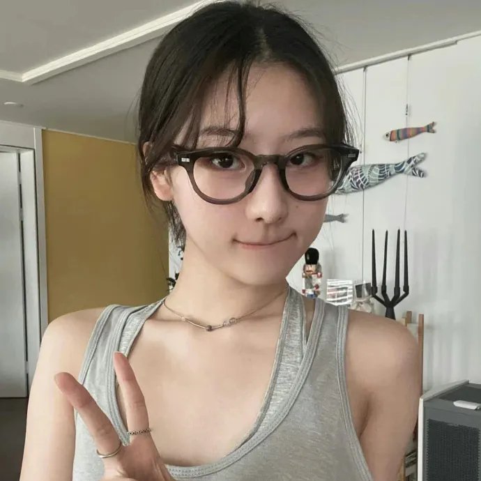 绿杨移作两家春